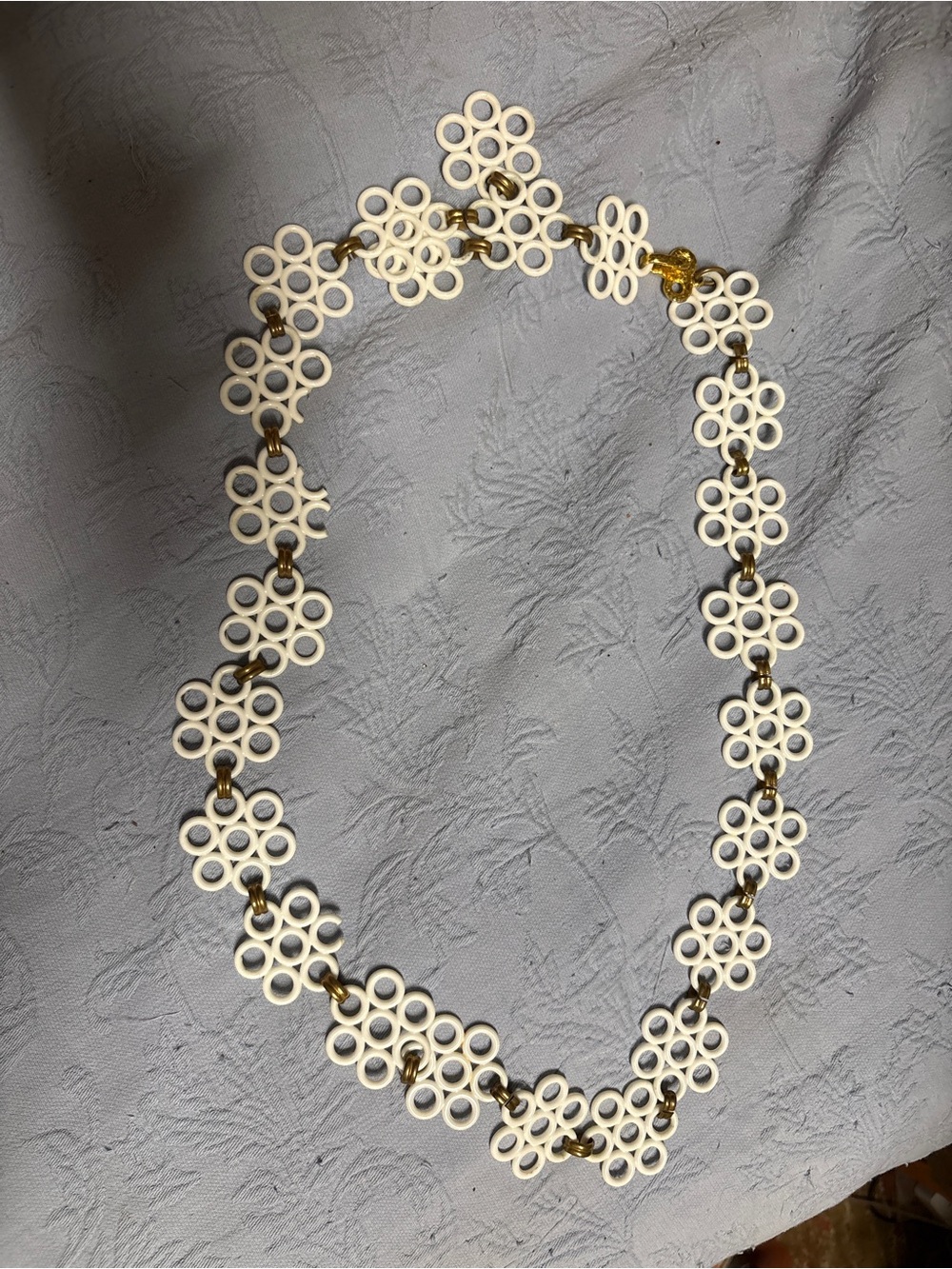 :
Vintage 1960s Mod Go Go Belt Ivory White Plastic Daisy Circle Links Gold Tone